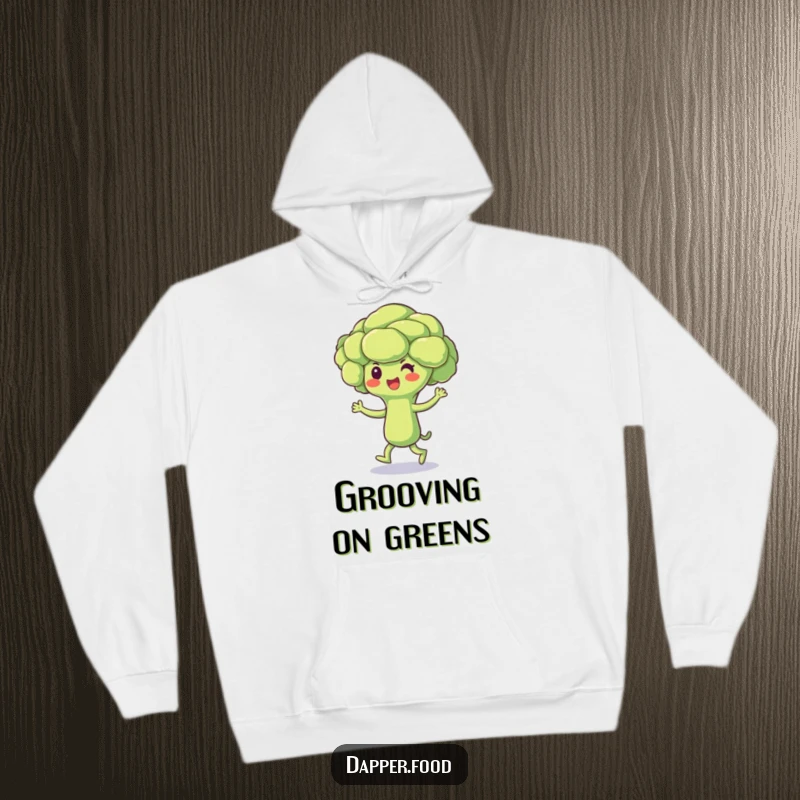 Funny Broccoli Hoodie featuring a beaming broccoli floret character doing a joyful jig, providing warmth and humorous cheer.