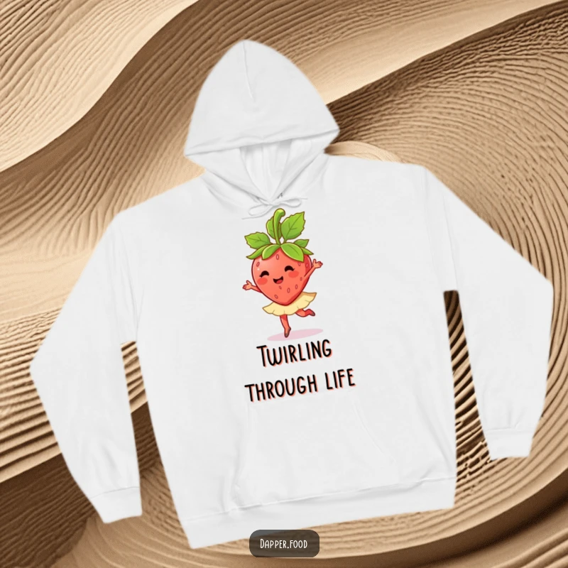 Funny anthropomorphic strawberry performing a ballet twirl with its leaves is featured on this warm and cozy hoodie.